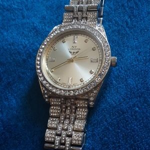 A NY London gold watch with simulated diamonds
